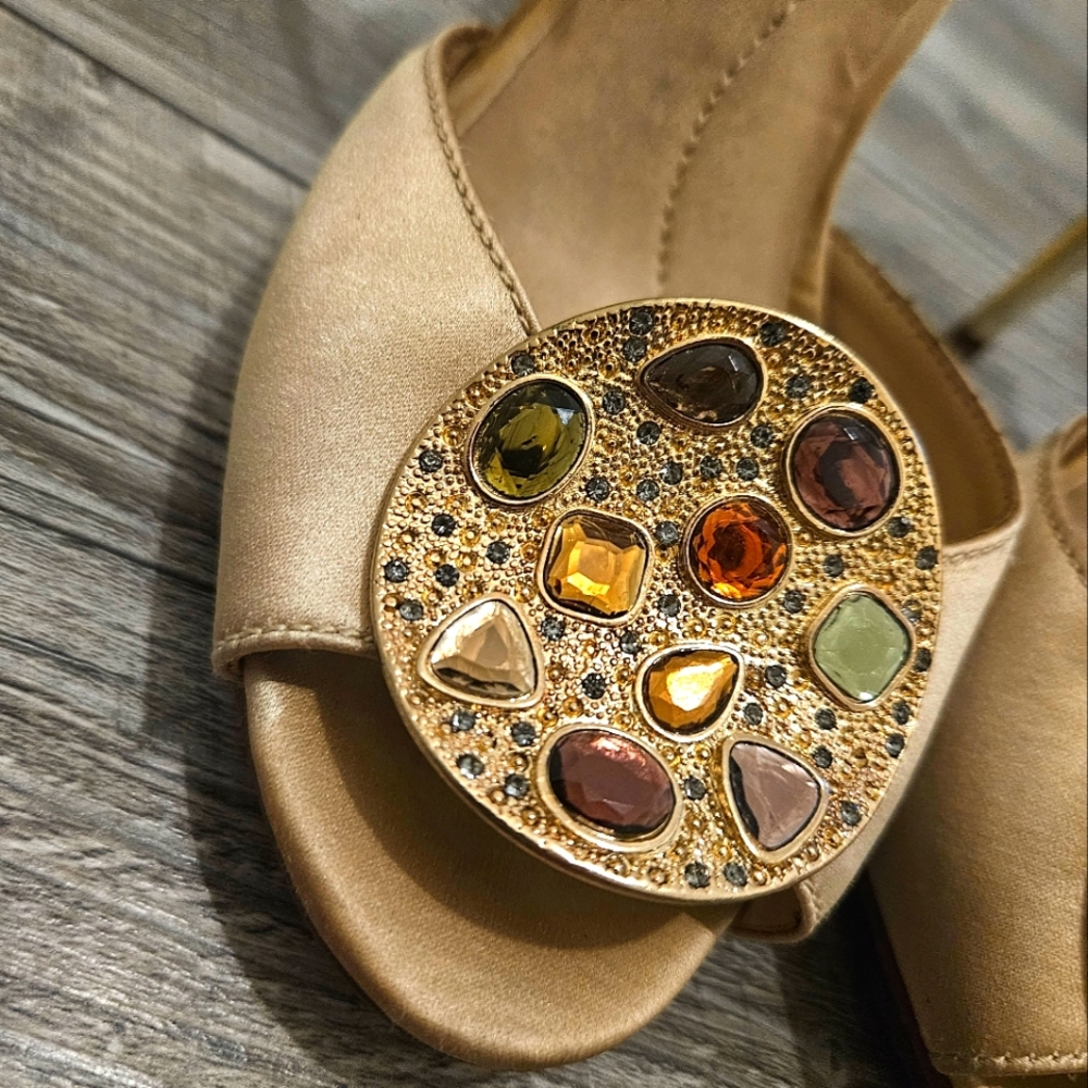 BCBG MAXAZRIA gold open-toe heels with medallion/jewels and gold shiny heel.